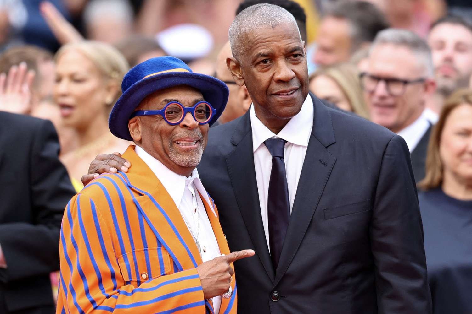 Spike Lee and Denzel Washington on the Cannes red carpet during the premiere of Highest 2 Lowest.