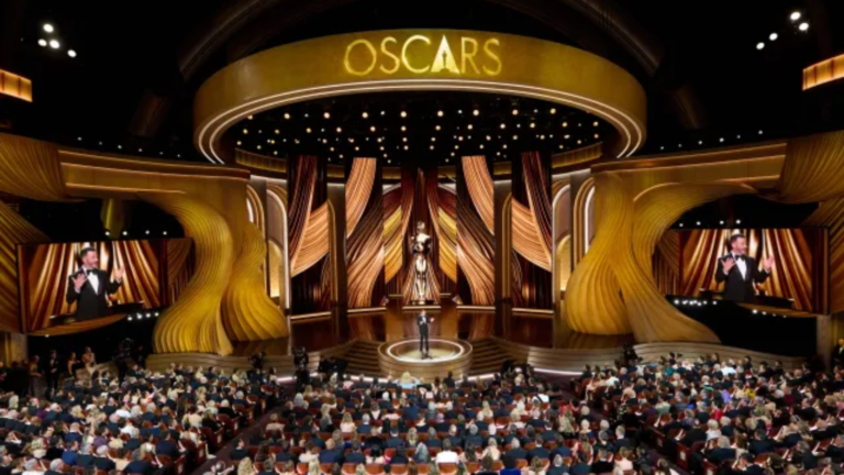 Oscars stage with golden set and audience during Academy Awards ceremony