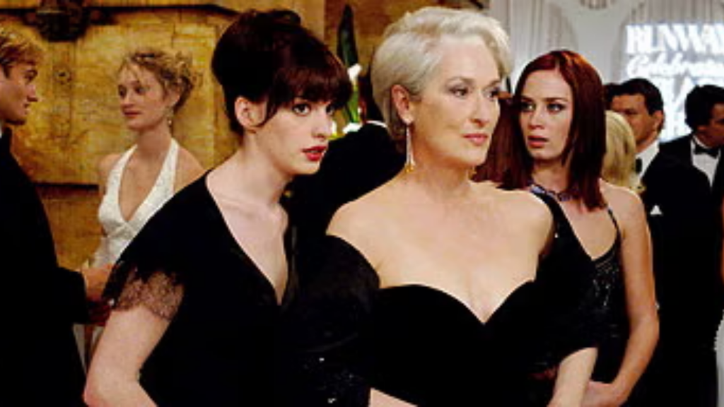 The Devil Wears Prada (2006) - Hathaway, Streep, and Blunt office party still
