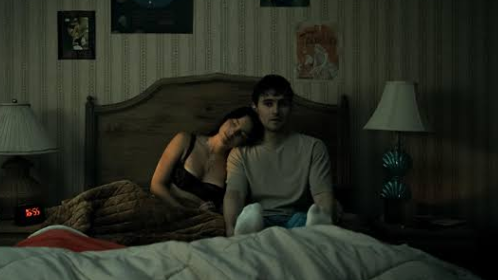 Obsession (2025) - Johnston and Navarrette in bed still